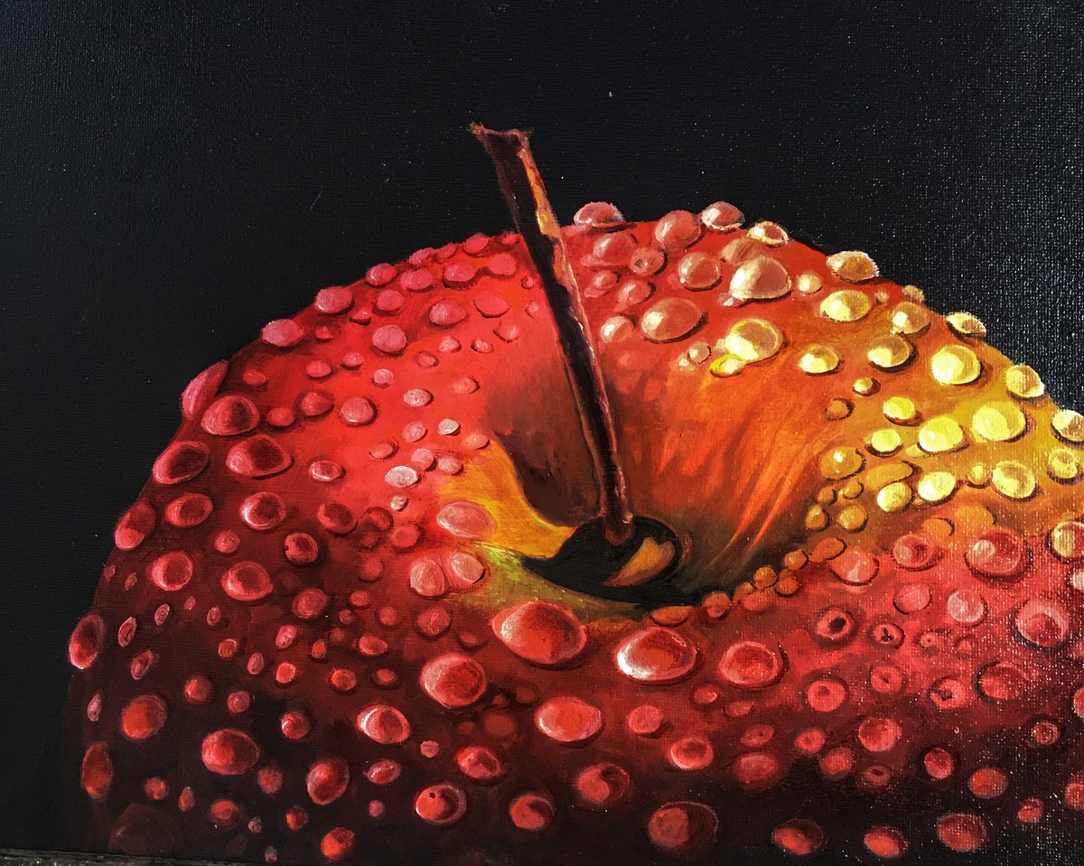 Hyper-real study of a red apple on black