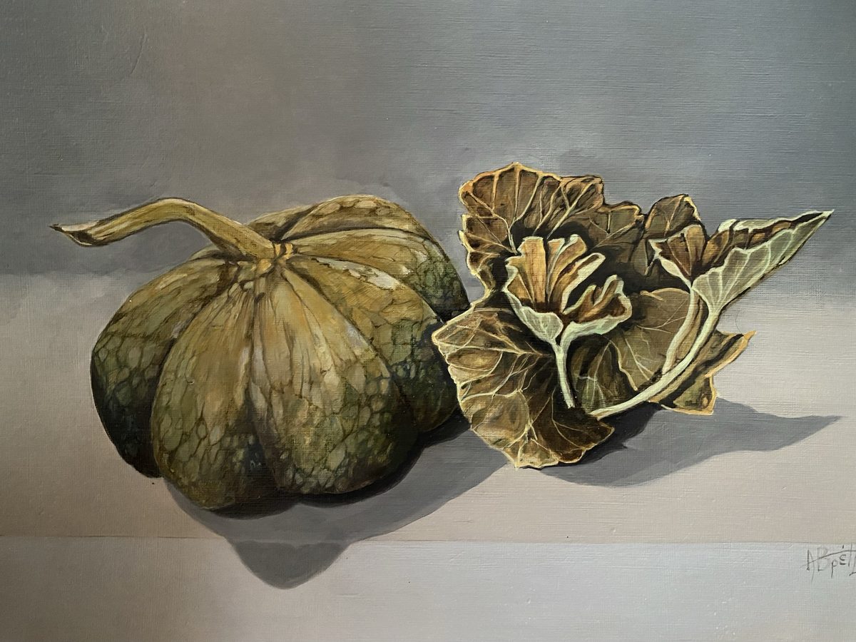Watercolor of a pumpkin with leaves
