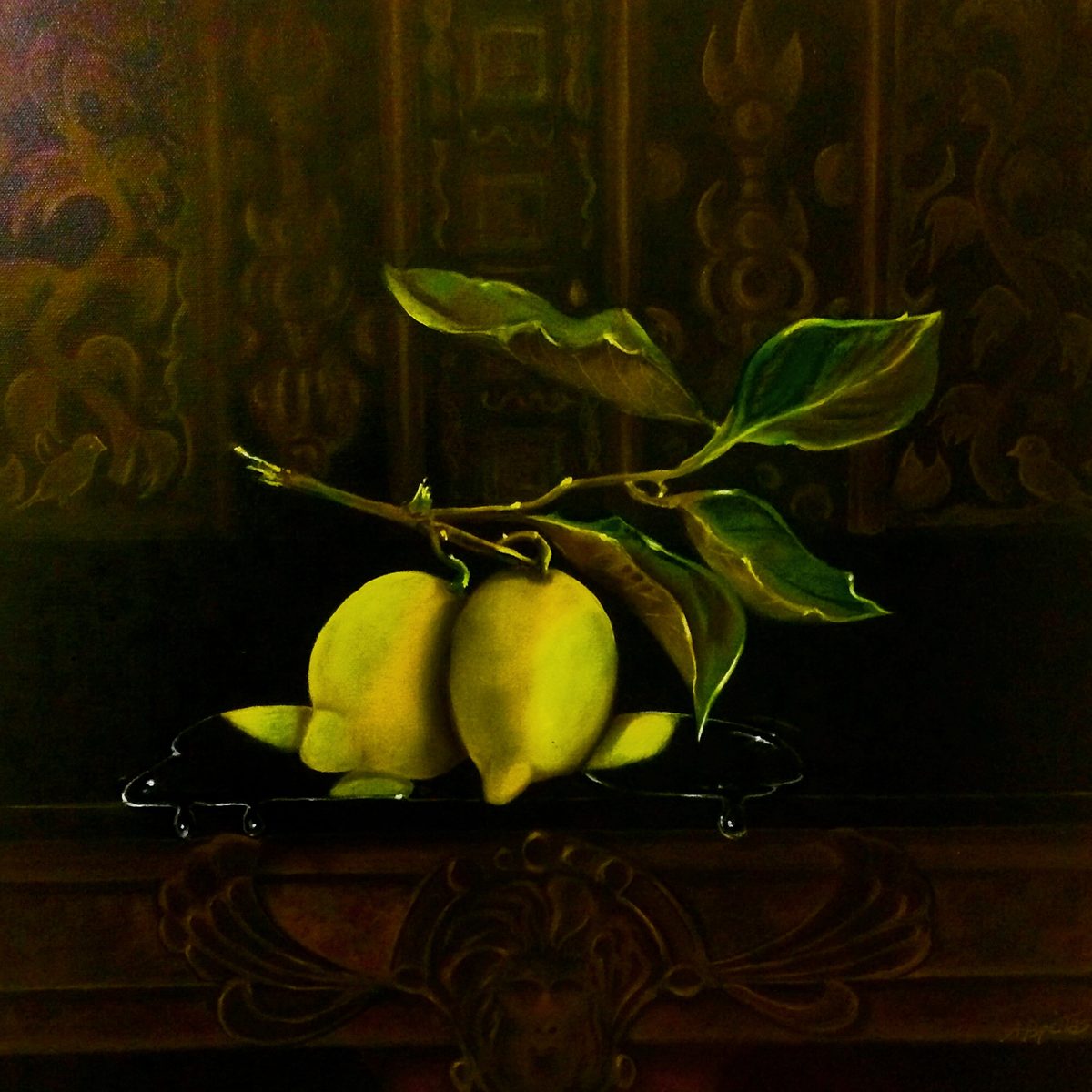 Still life of lemons against an ornate dark background